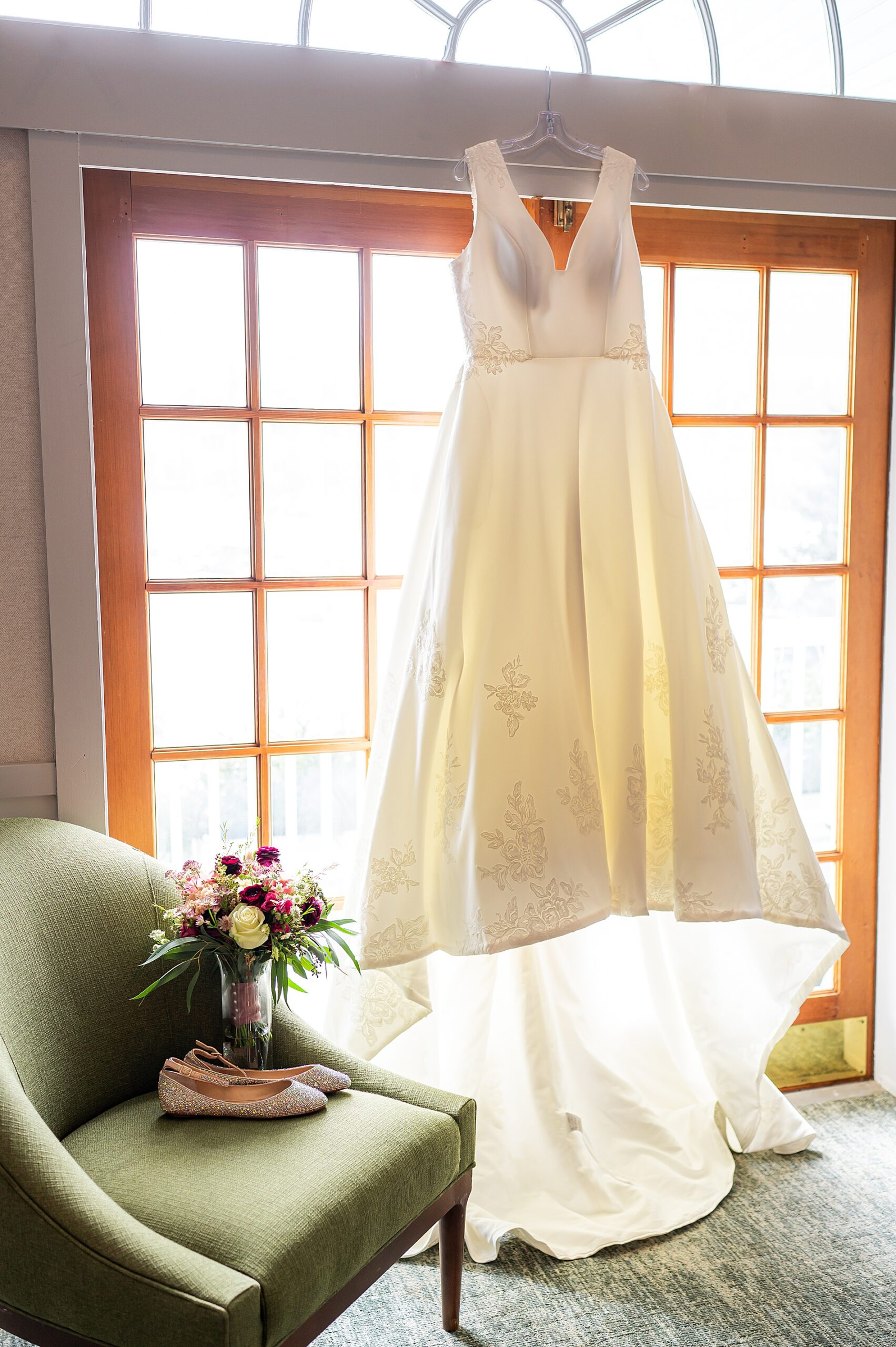 Wedding gown hang in the window