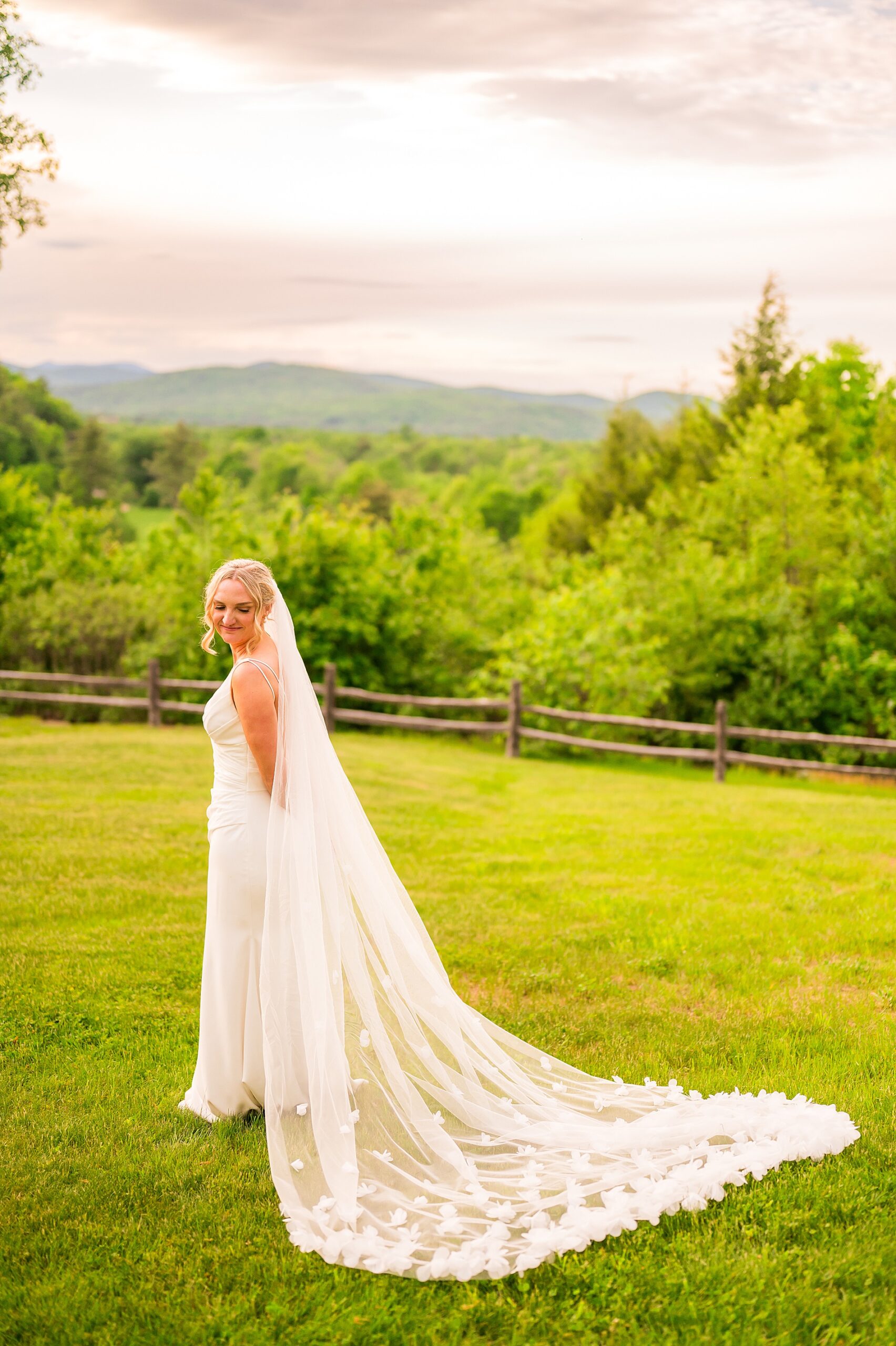 bridal portraits on the hilltop of The Barn on the Pemi 