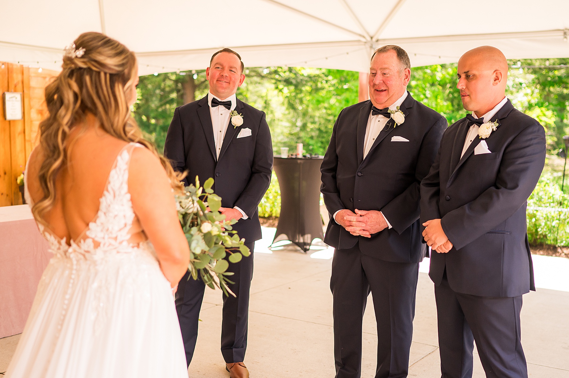 bride's first look with stepdad and brothers