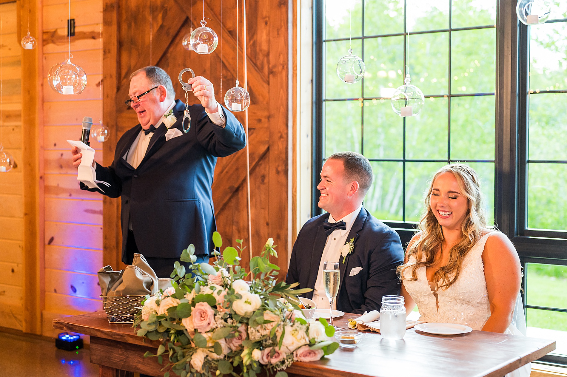 father of the bride gives wedding toasts 