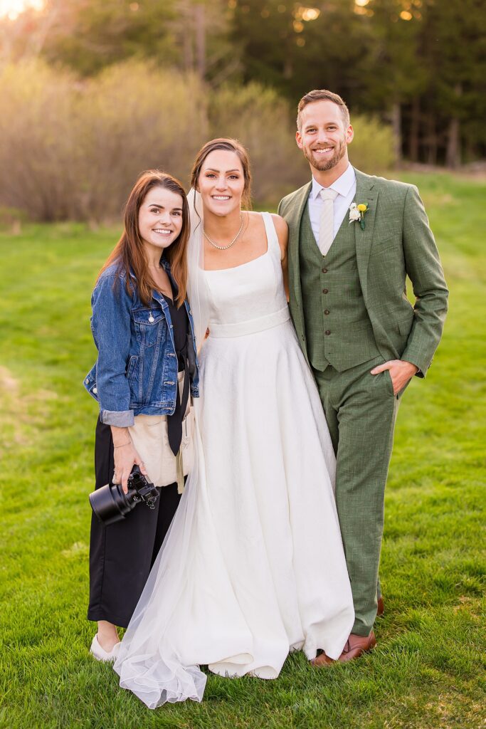 Southern NH wedding photographer, Allison Clarke with newlyweds