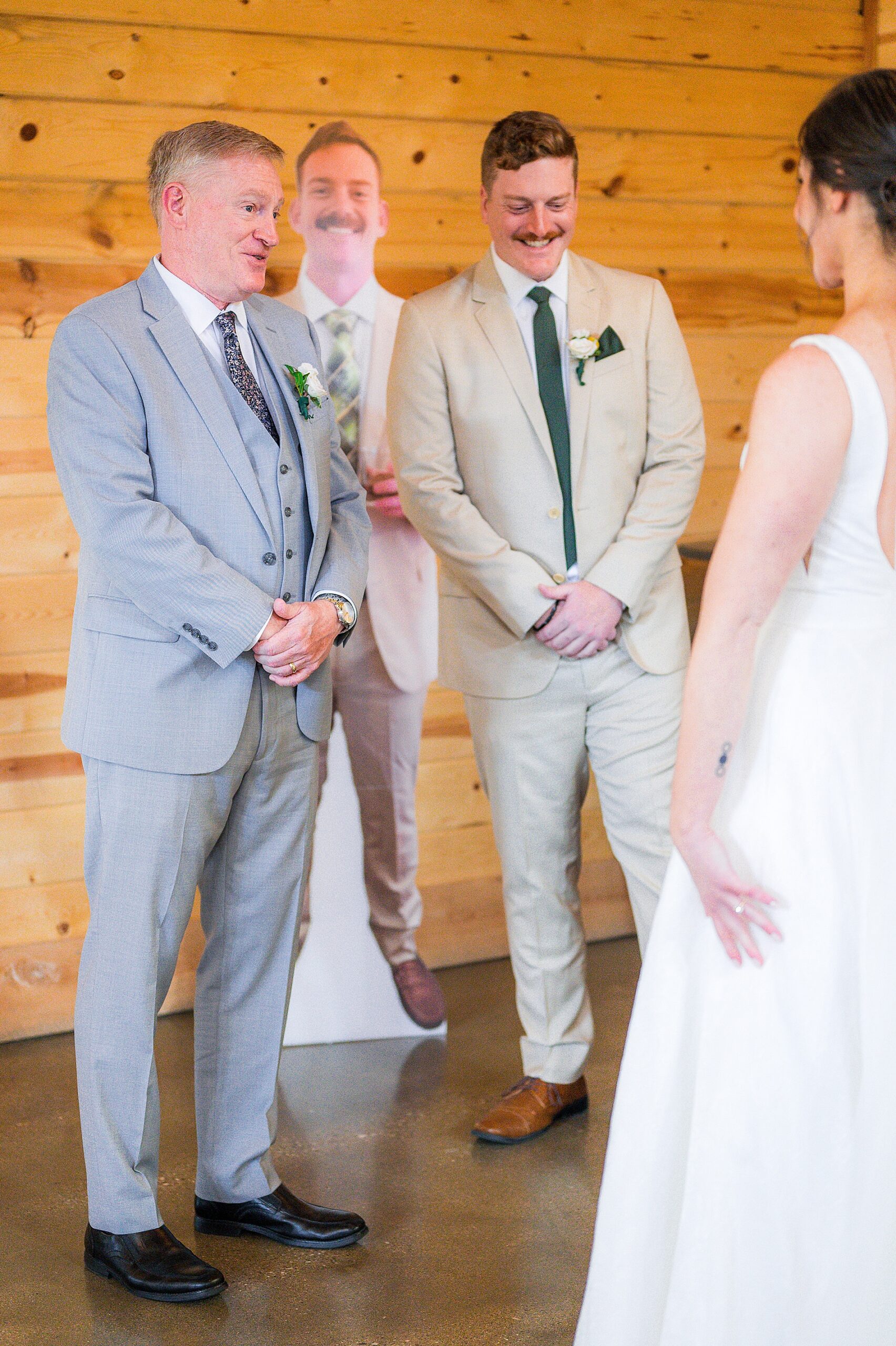bride's first look with dad and brother
