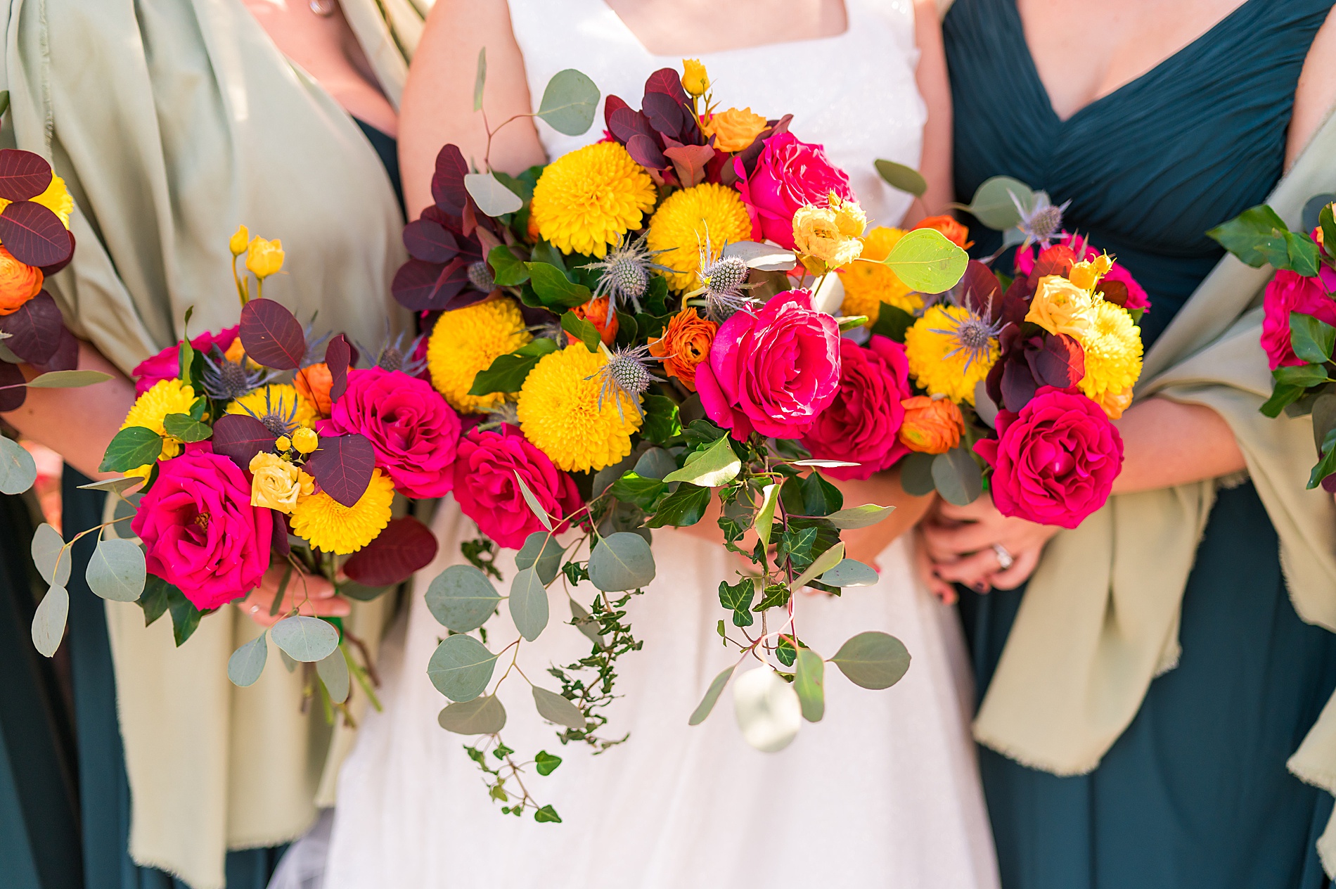 pink and yellow wedding bouquets