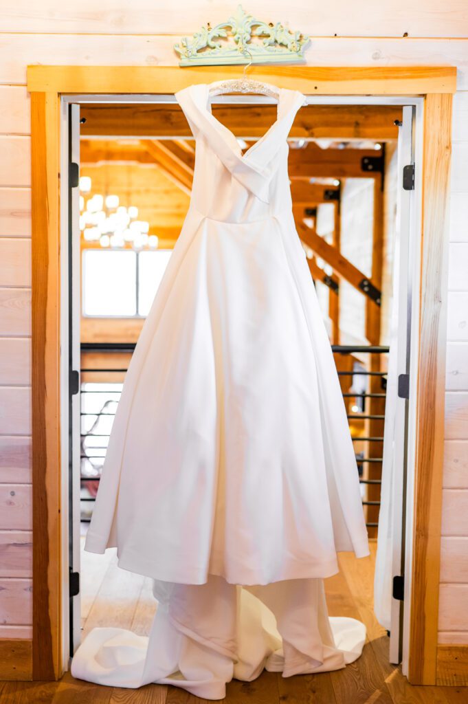 Hanging wedding dress | March wedding at the barn at bull meadow