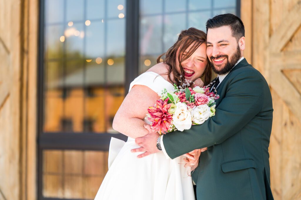 Bride and groom with bouquet