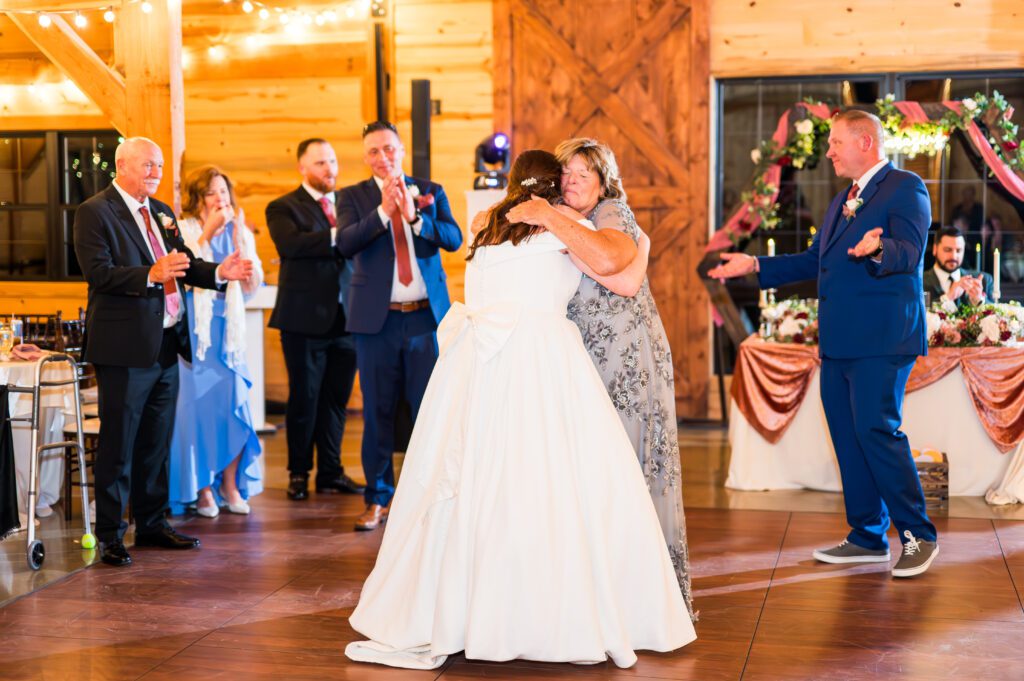 Bride and mother hug