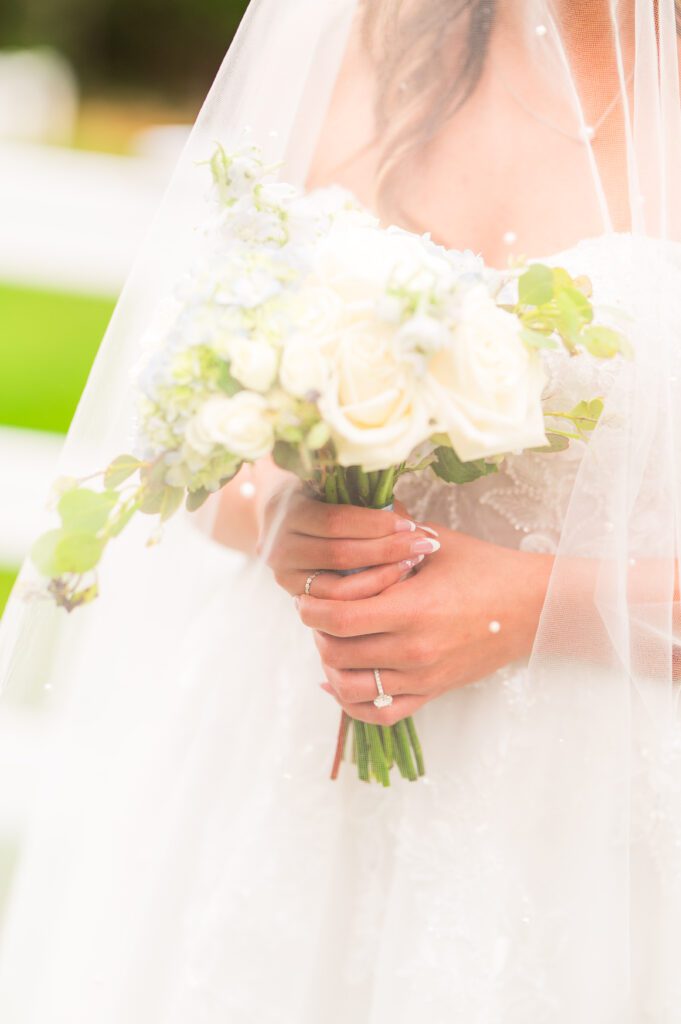 Bride with bouquet | Dusty blue spring wedding